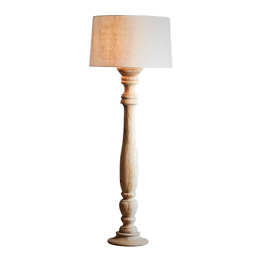 Large base floor clearance lamp