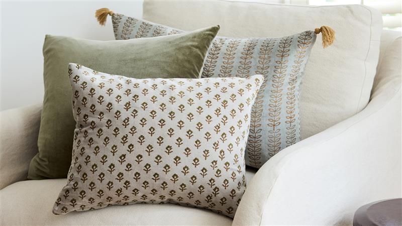 <h2>Curated Comfort</h2><button>Explore Cushions</button>