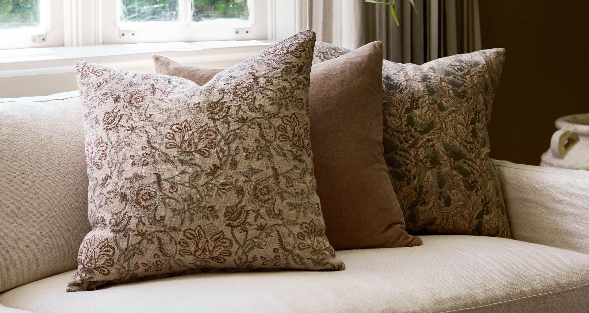 <h2>Perfectly Cushioned </h2><button>Shop Our Cushion Covers</button>