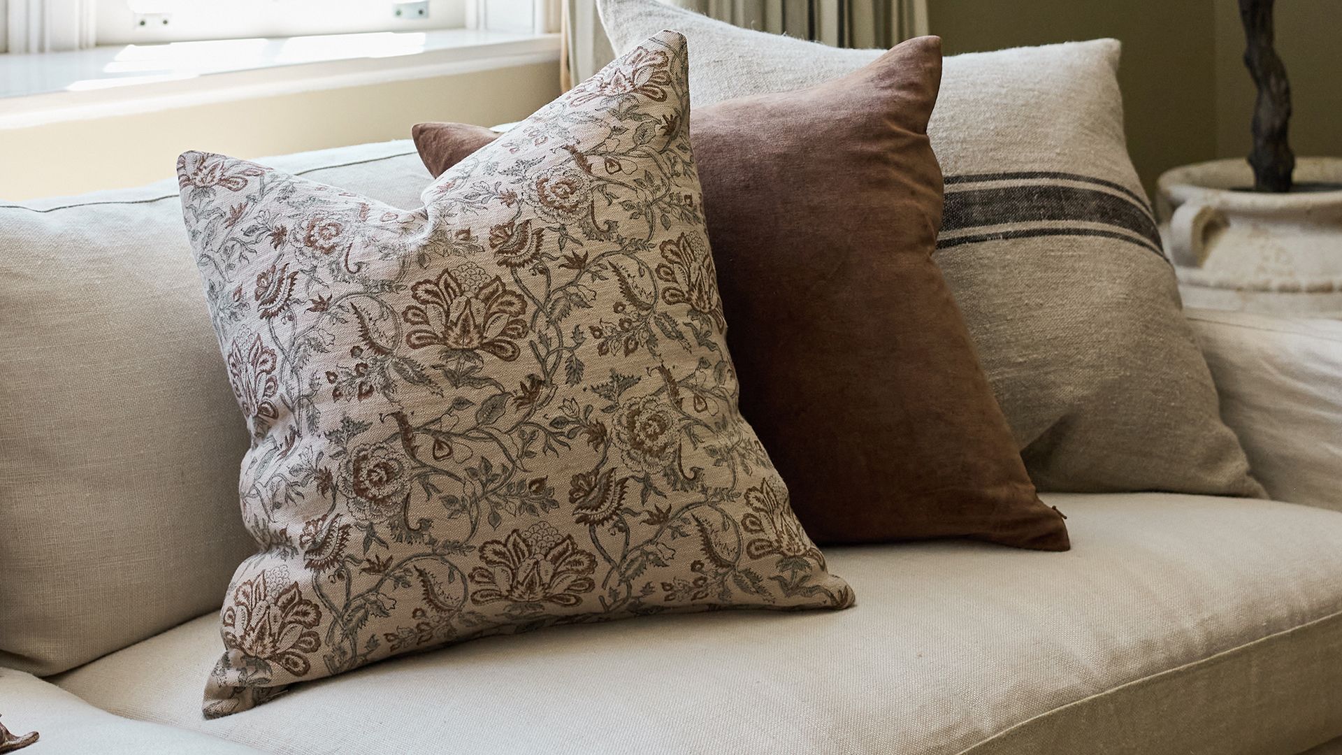 <h2>Perfectly Cushioned</h2><button>Shop Our Cushion Covers</button>