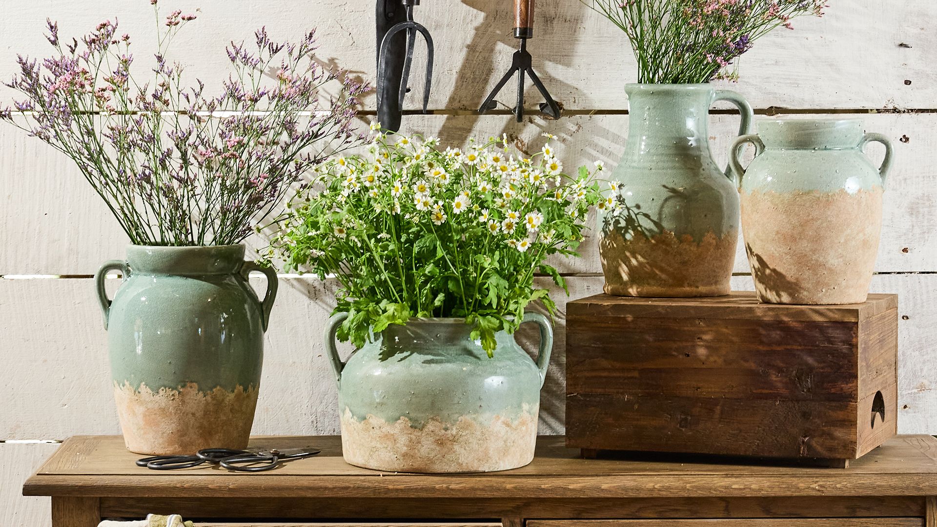 <h2>The Perfect Vessel</h2><button>Shop Tea Light Houses</button>