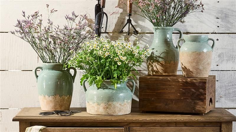 <h2>The Perfect Vessel</h2><button>Shop Tea Light Houses</button>