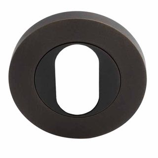 OVAL CYLINDER ESCUTCHEONS DARK ROMAN BRASS