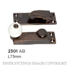 TRADCO 2301 SASH FASTENER PORCELAIN BALL ANTIQUE BRASS