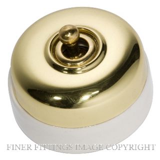 TRADCO 5100 IVORY PORCELAIN BASE SWITCH POLISHED BRASS