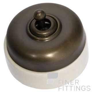 TRADCO 5105 IVORY PORCELAIN BASE SWITCH ANTIQUE BRASS