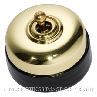 TRADCO 5150 BLACK PORCELAIN BASE SWITCH POLISHED BRASS