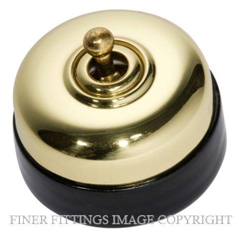 TRADCO 5150 BLACK PORCELAIN BASE SWITCH POLISHED BRASS