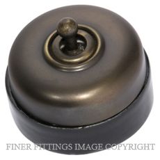 TRADCO 5155 BLACK PORCELAIN BASE SWITCH ANTIQUE BRASS