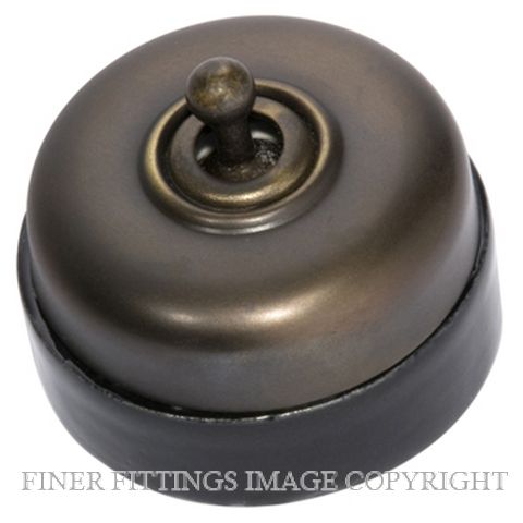 TRADCO 5155 BLACK PORCELAIN BASE SWITCH ANTIQUE BRASS