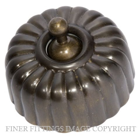 TRADCO 5570 FLUTED SWITCH ANTIQUE BRASS