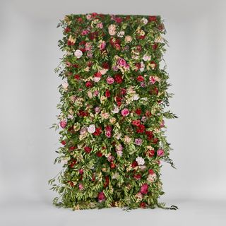 Flower Wall With Pink, Purple, Beige & Red Roses & Peonies and green leaves