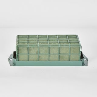 Caged Oasis Floral Foam attached to plastic base