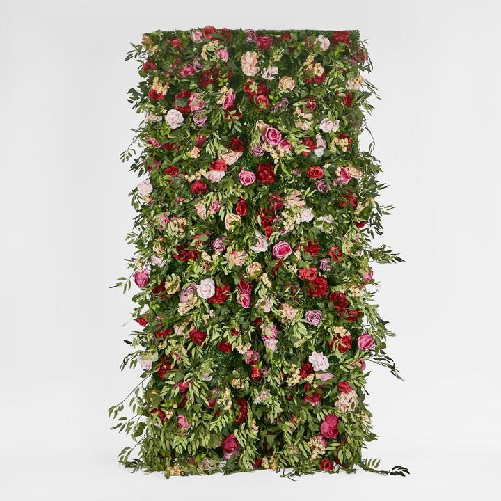Flower Wall With Pink, Purple, Beige & Red Roses & Peonies and green leaves