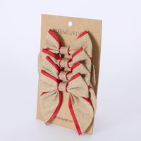 Jute Trim Bows w Clip Red - Set of 4