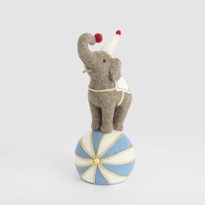 Carnival Balancing Elephant on Blue Ball
