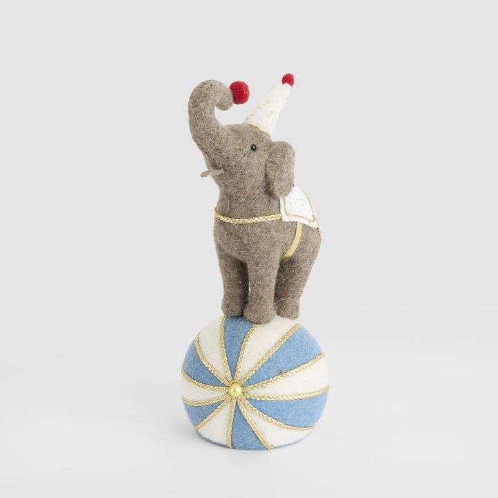 Carnival Balancing Elephant on Blue Ball