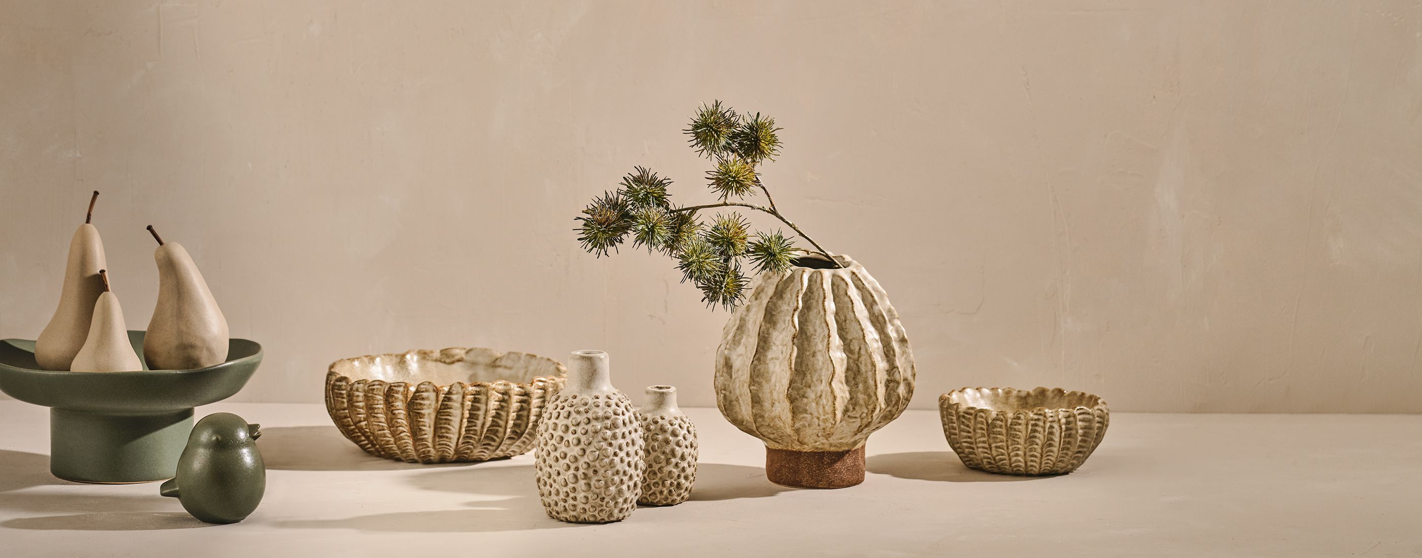 <div class='slider-right'><span>SPRING SUMMER 2025</span><h2>EVERYDAY ELEVATED</h2><a href='#' class='btn'>Explore</a></div>