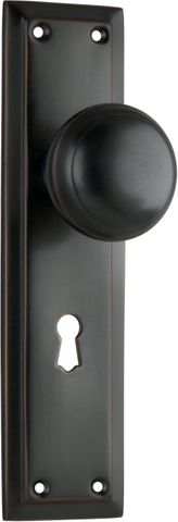 TRADCO DOOR KNOB RICHMOND LOCK PAIR ANTIQUE COPPER