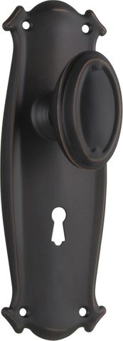 TRADCO DOOR KNOB BUNGALOW LOCK PAIR ANTIQUE COPPER