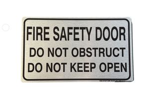 Fire Safety Door 
Do Not Obstruct
Do Not Keep Open                         
Brushed Aluminum - Black Letters
250 x 150 ACM Sign