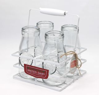 Vintage style, Metal bottle holder, includes 4 small,  glass bottles.