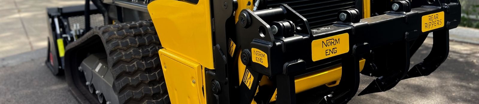 <h2>Hydraulic Rear Rippers</h2>                                     <p>INCREASING YOUR MACHINES CAPABILITIES</p><button><b>EXPLORE NOW</b></button>