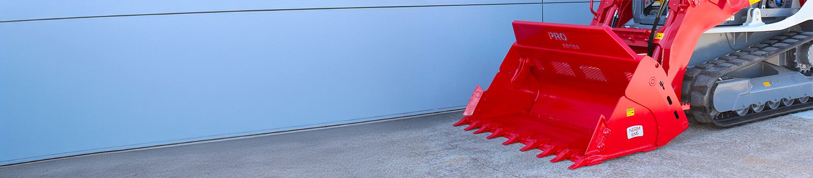 <h2>PRO SERIES 4-IN-1</h2><h2>LOADER STYLE BUCKET</h2>                                     <p>REVOLUTIONISING EFFICIENCY AND PERFORMANCE</p><button><b>EXPLORE NOW</b></button>