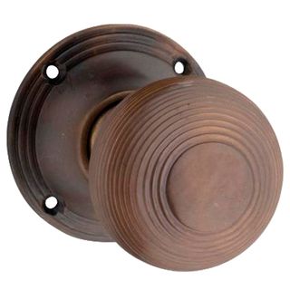 KNOB ON ROSE ANTIQUE BRASS