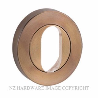 LOCKWOOD 1226/IAU OVAL CYLINDER ESCUTCHEON ARCHITECTURAL BRONZE UNLACQUERED