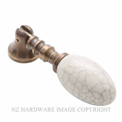 TRADCO 3040  DROP HANDLE PORCELAIN IVORY PORCELAIN-ANTIQUE BRASS