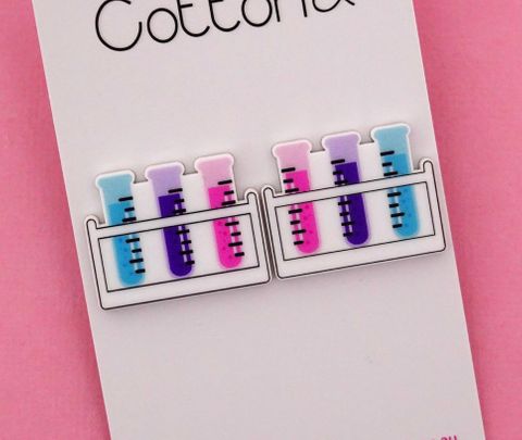 Studded earrings test tube