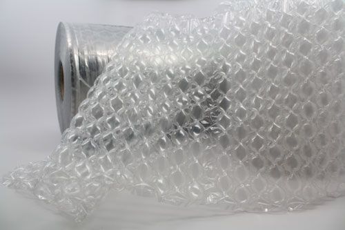 Inflatable air pillow void fill in a carton