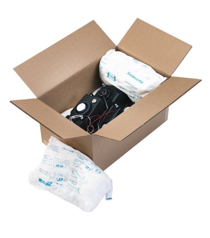 Instapak Quick RT foam cushions protecting an automotive part in a cardboard box