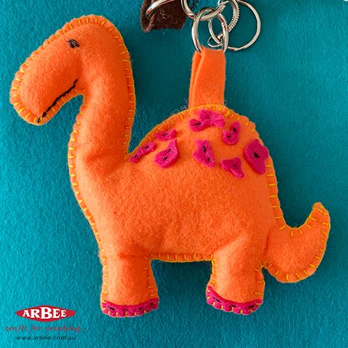 Handmade felt dinosaur toy