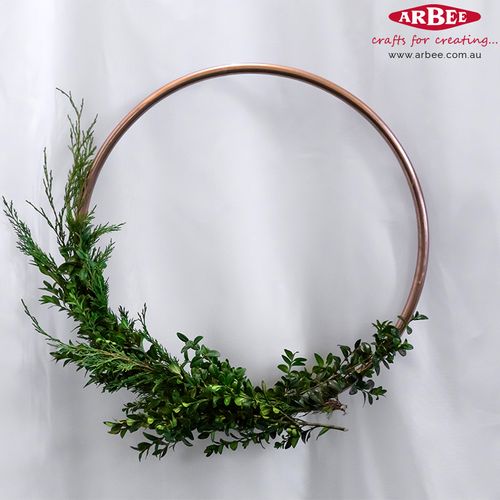 leafy wreath on bronze ring