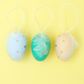 EASTER GOLD SPOT EGGS W/ FEATHERS 6PCS