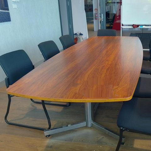 Secondhand Boardroom Table. Boatshaped Top L3000 x D1200/1000mm with Chrome Base