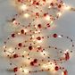 Talking Tables - Red Bead String Lights - 60 LEDs - Botanical Holly