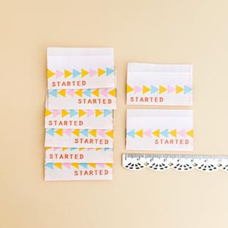 MINKI KIM STARTED WOVEN LABELS