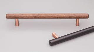 TILLA HANDLE 160MM BLACK STAIN WITH COPPER FEET